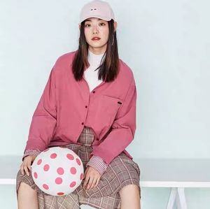 Pink corduroy shirt with red plaid cuff